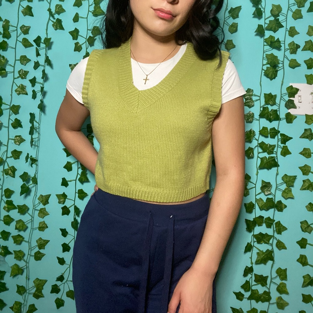 green sweater vest